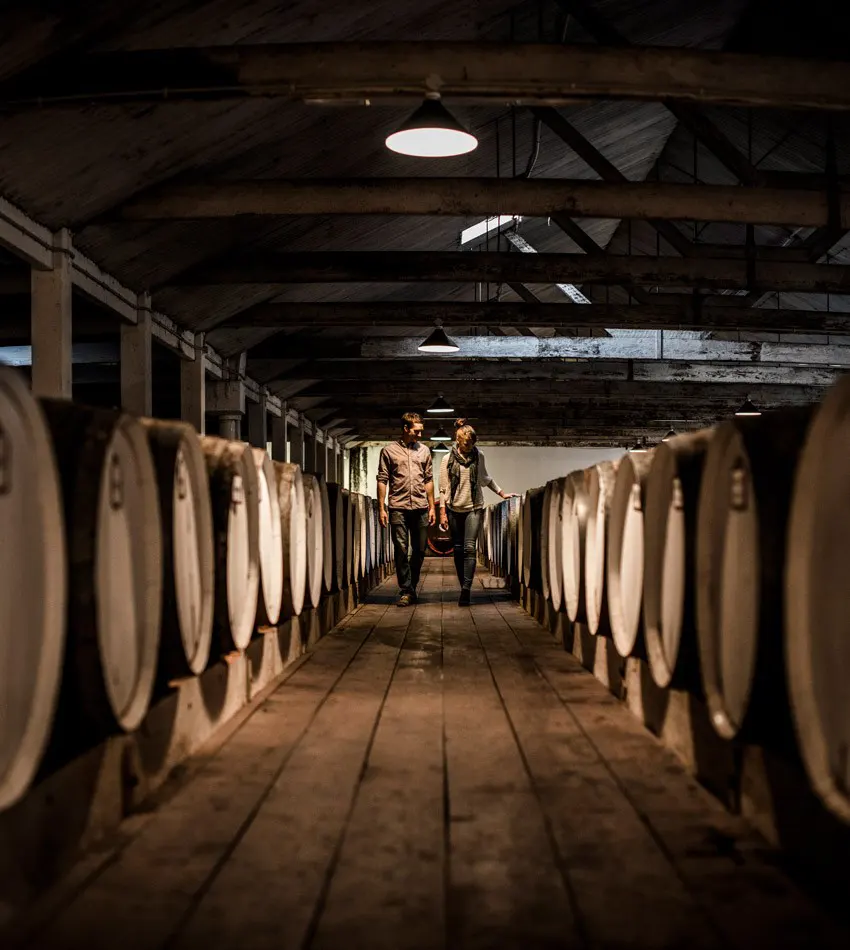 Two guests walking through Seppeltsfield’s Centennial Cellar