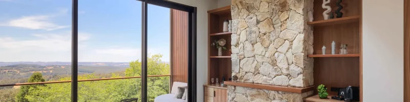 Lounge area and balcony of a Sequoia Lodge suite